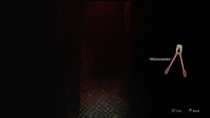 James uses Wire Cutters on a steel gate in the Labyrinth in the Silent Hill 2 remake
