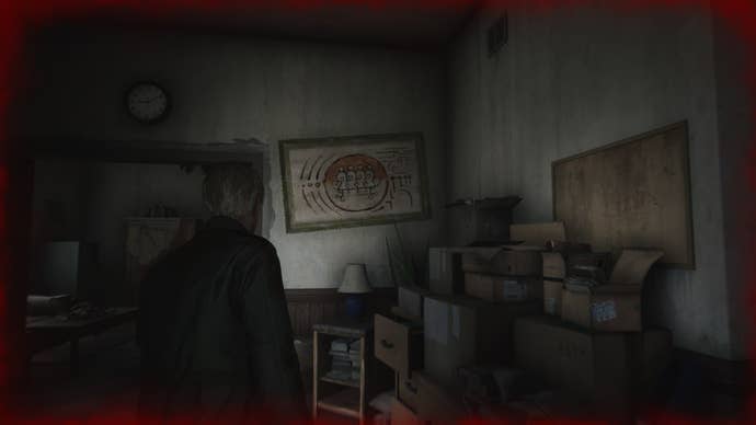 James looks at a painting found in the Employee Section of Lake View Hotel in the Silent Hill 2 remake