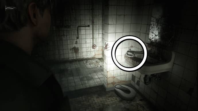 A white circle showing the Medical Tube item on top of a sink in Silent Hill 2.