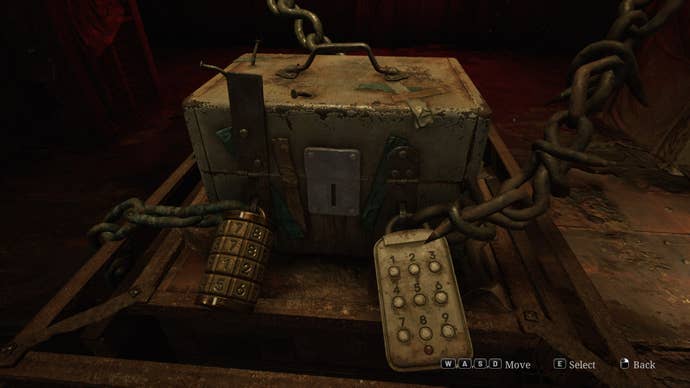 James looks at a chained box with three different locks on it in the Otherworld Hospital in the Silent Hill 2 remake