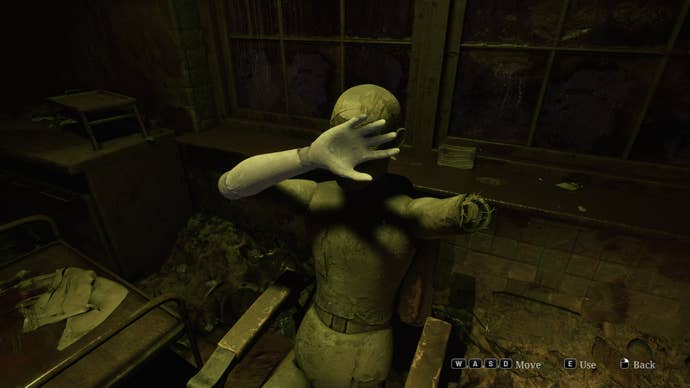 James uses the Instrument of Force to destroy a mannequins arm in the Otherworld Hospital in the Silent Hill 2 remake