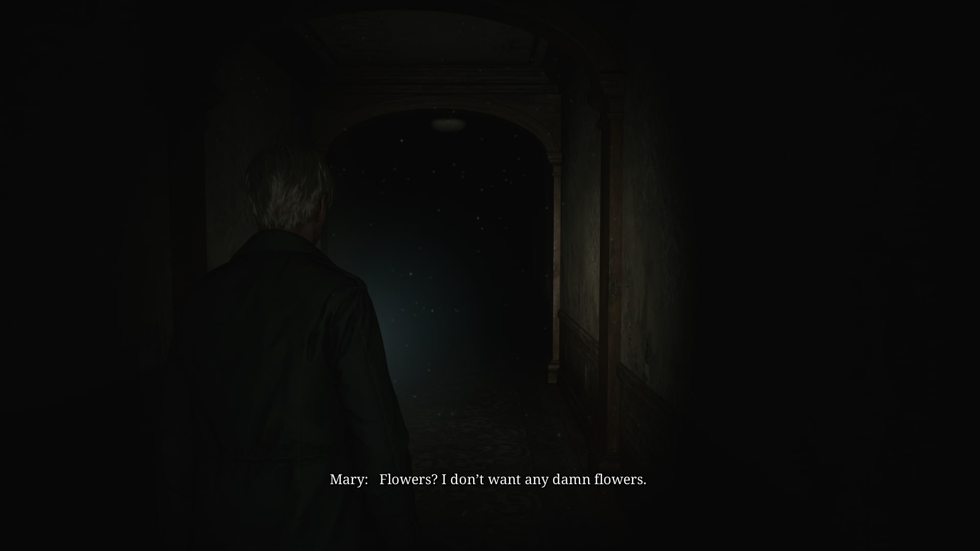 James walks down the long hallway where the sick-bed dialogue occurs in the Silent Hill 2 remake