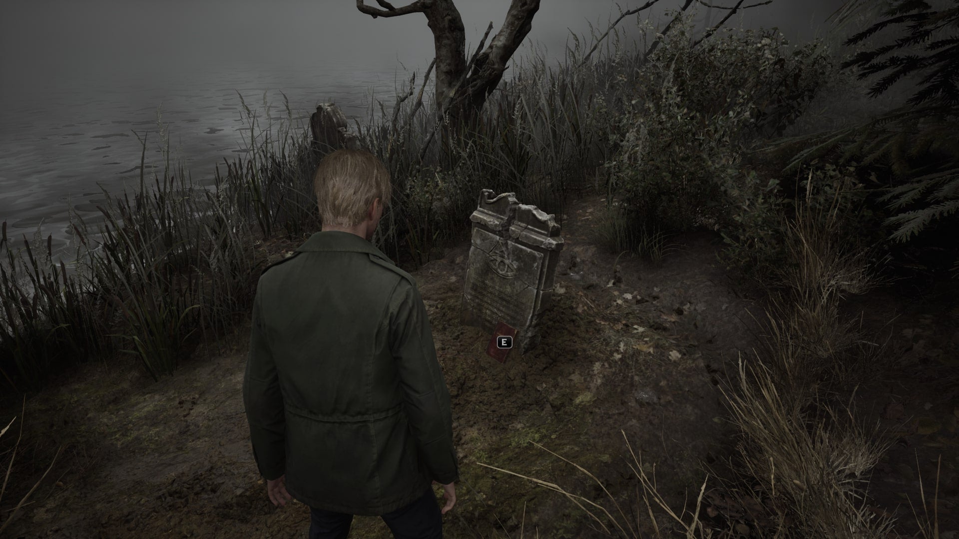 James looks at a gravestone with the Crimson Ceremony book on it in the Silent Hill 2 remake