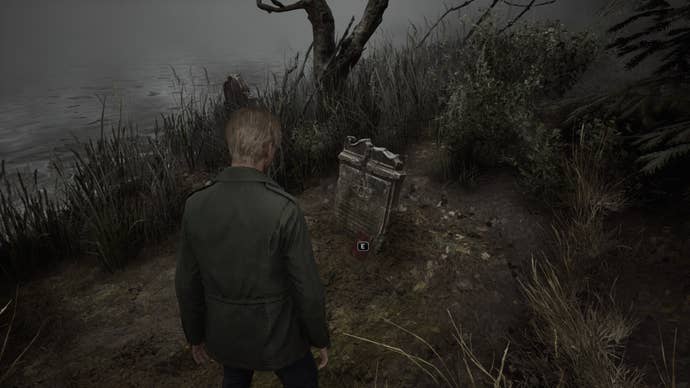 James looks at a gravestone with the Crimson Ceremony book on it in the Silent Hill 2 remake