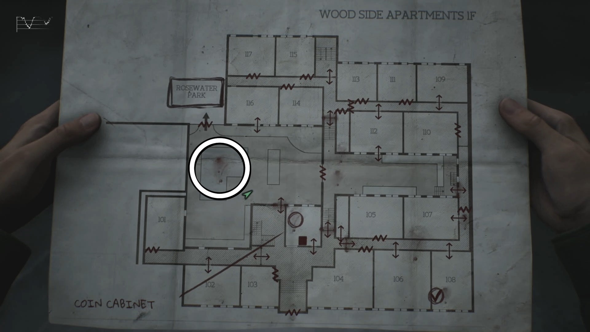 White circle showing the Snake Coin location on the map in Silent Hill 2.