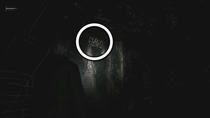 A white circle showing a picture on the wall for the Room 206 safe code puzzle solution in Silent Hill 2.