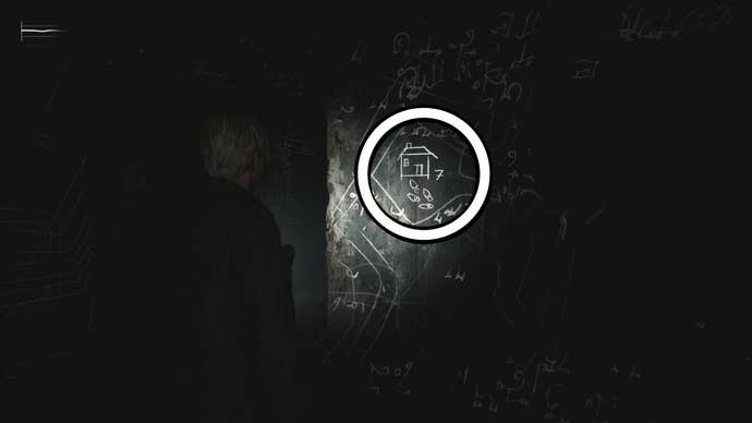 A white circle showing a picture on the wall for the Room 206 safe code puzzle solution in Silent Hill 2.