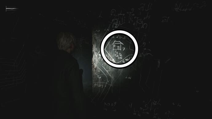 A white circle showing a picture on the wall for the Room 206 safe code puzzle solution in Silent Hill 2.