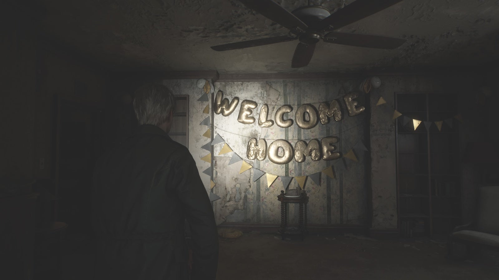 James looking at golden ballons on an apartment wall that spell out &lsquo;Welcome Home&rsquo; in Silent Hill 2.