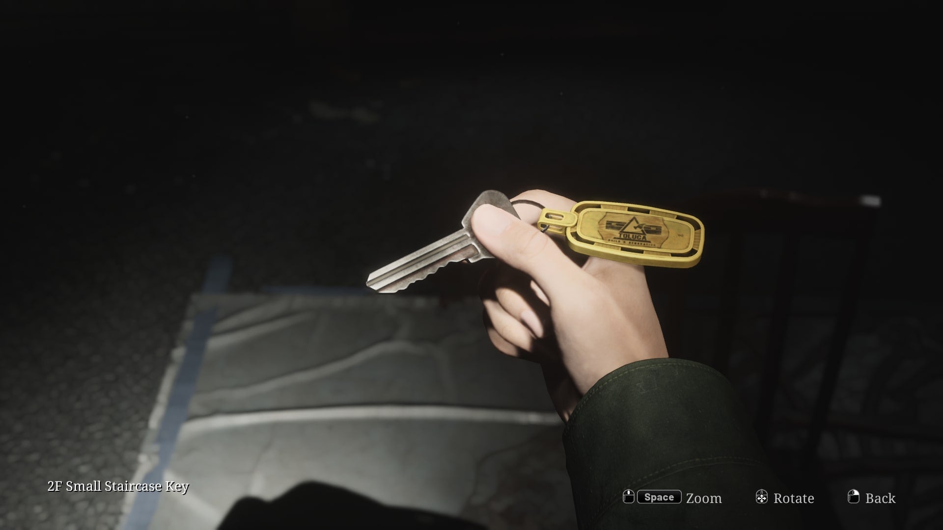 James collects the 2F Small Staircase Key in Wood Side Apartments in the Silent Hill 2 remake - 10