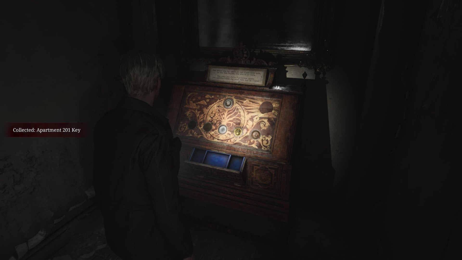 James solves the Coin Cabinet puzzle and retrieves a key in Wood Side Apartments in the Silent Hill 2 remake - 13