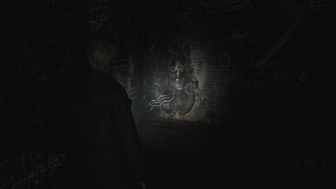 James looks at one of three drawings in Room 206 of Wood Side Apartments in the Silent Hill 2 remake
