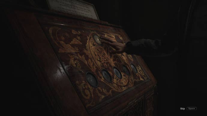The Coin Cabinet puzzle of Wood Side Apartments is shown in the Silent Hill 2 remake