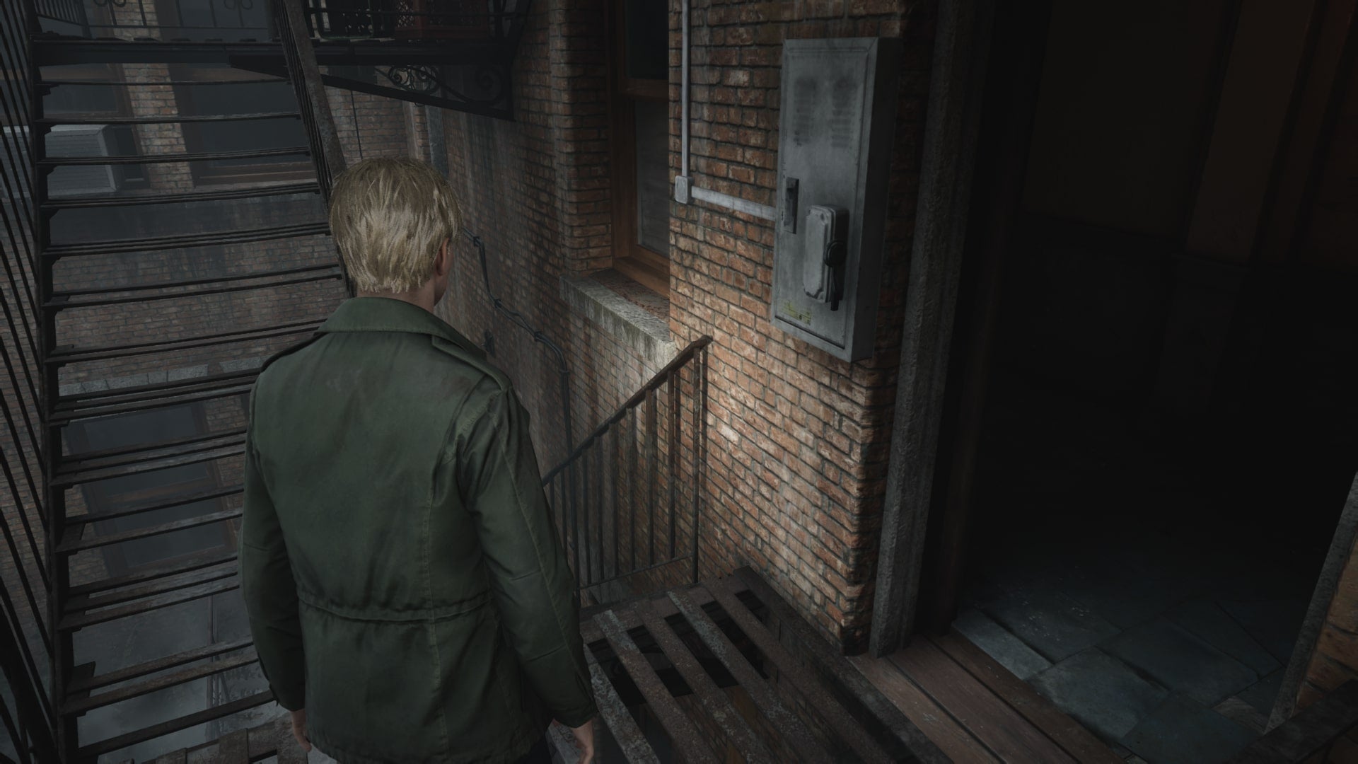 James stand beside a lever for the stairwell of Wood Side Apartments in the Silent Hill 2 remake - 6