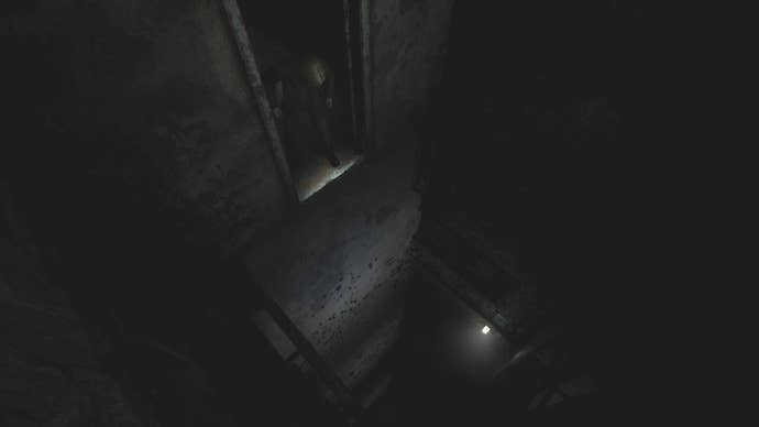 James looking down at a big drop into the Prison area in Silent Hill 2.