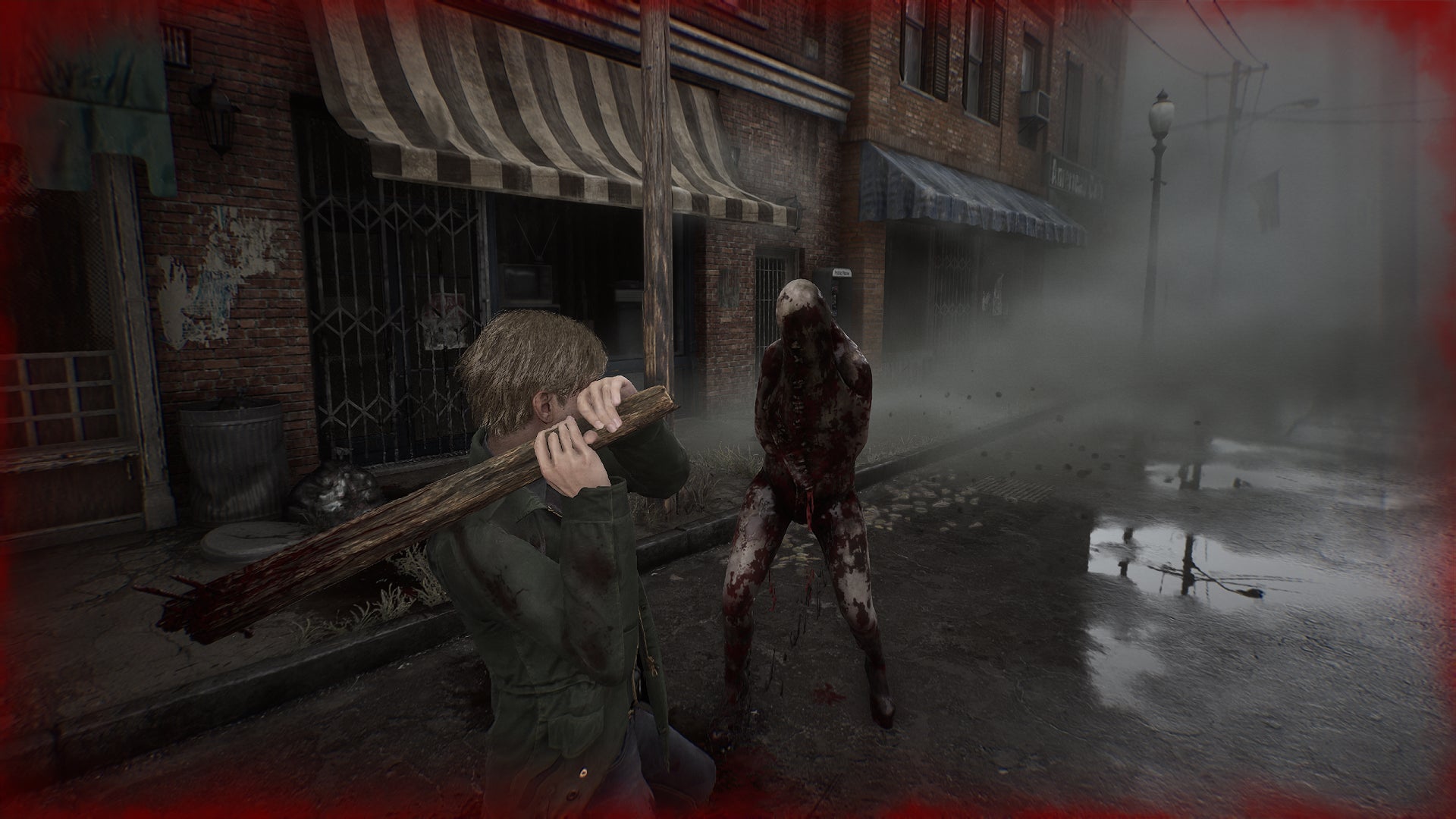 James fights a Lying Figure monster in the streets in the Silent Hill 2 remake. - 4