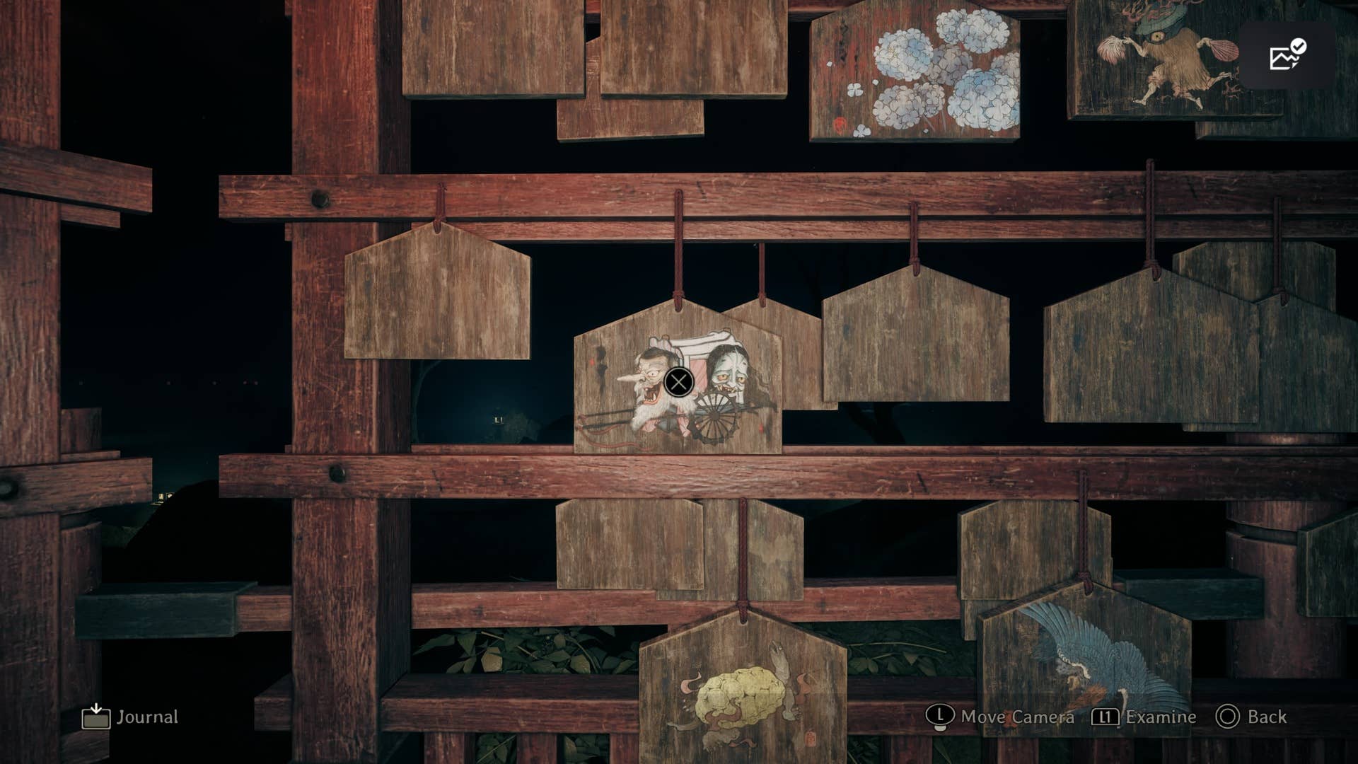Hinako olha para um ema representando o yokai do carruagem em Silent Hill F