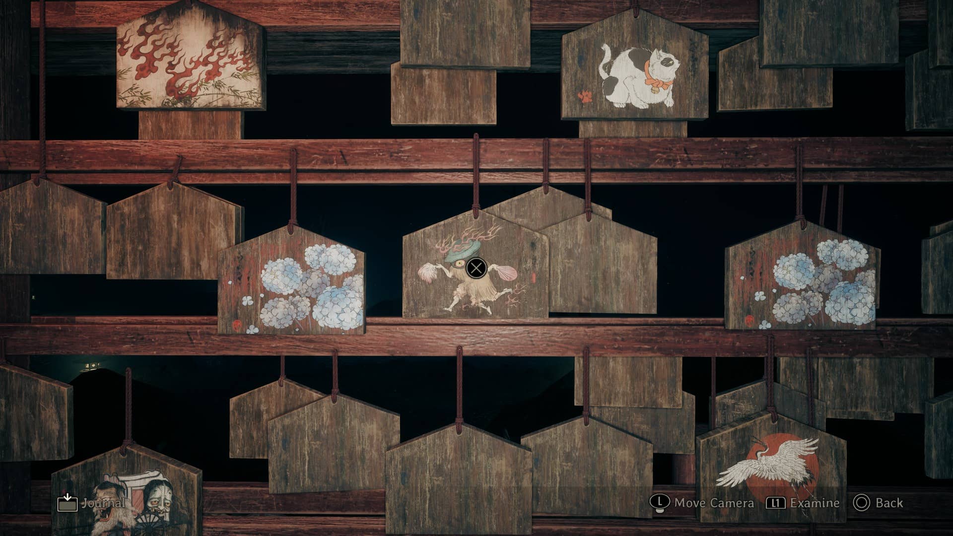 Hinako olha para um ema representando o Yokai da chaleira em Silent Hill F
