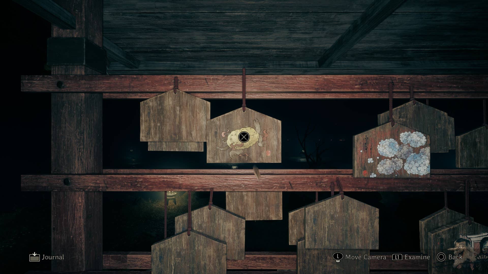 Hinako olha para um EMA que descreve uma tartaruga em Silent Hill F
