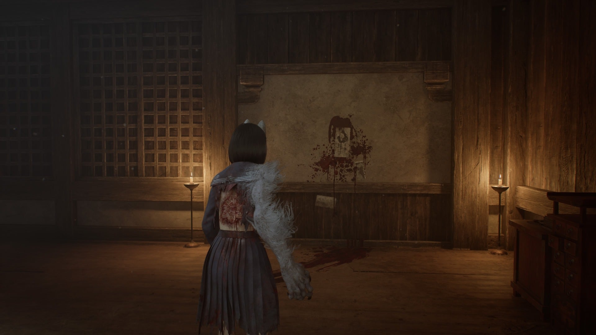Hinako looks at a wall that can be focused on to reveal a hidden passage in the Main Hall's attic in Silent Hill f