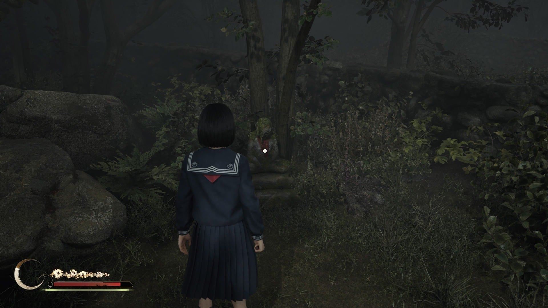 Hinako looks at the second jizu statue in Silent Hill f