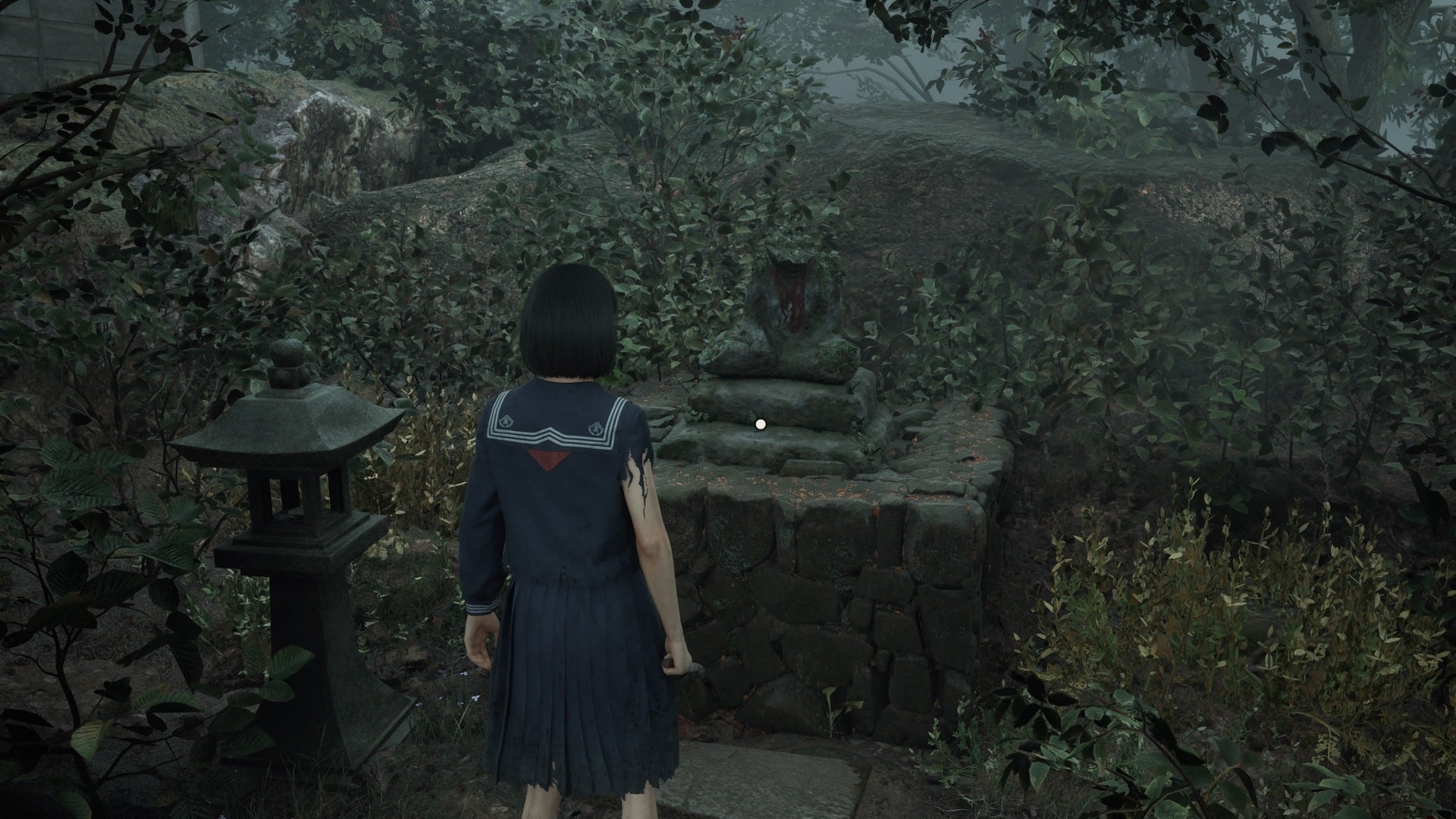 Hinako looks at the third jizu statue in Silent Hill f