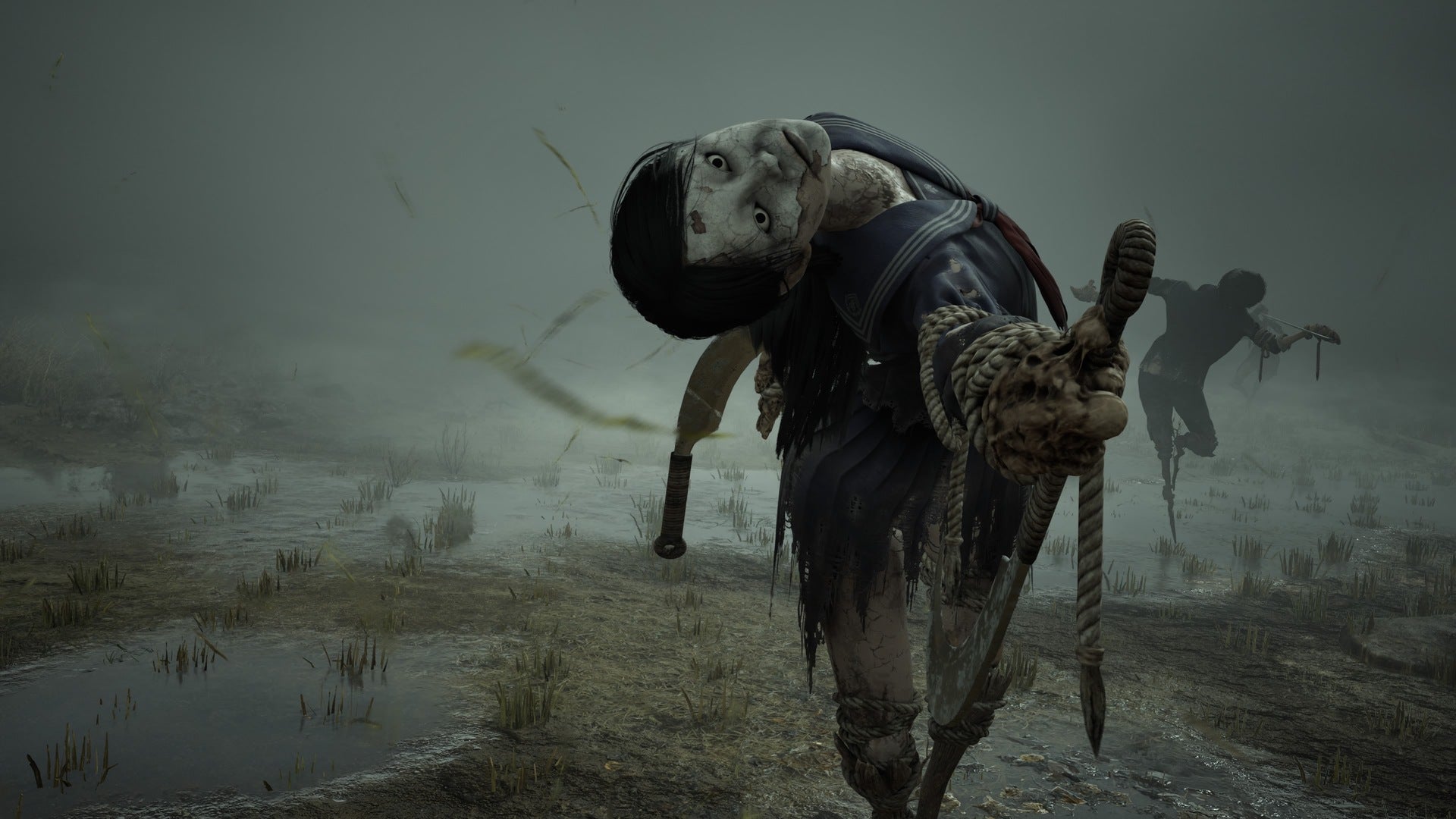 A contorted scarecrow can be seen pointing in a direction in Silent Hill f
