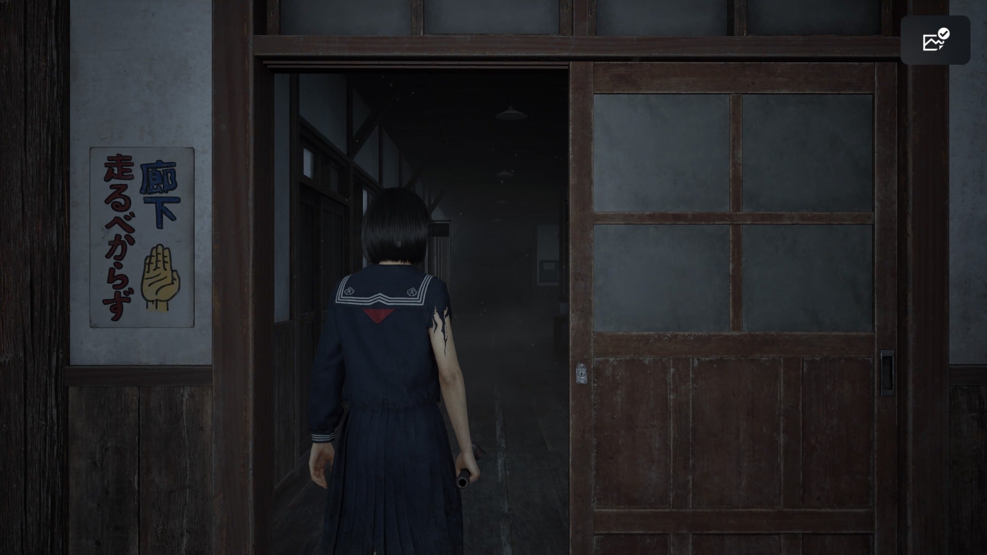 Hinako enters the second floor of the middle school in Silent Hill f