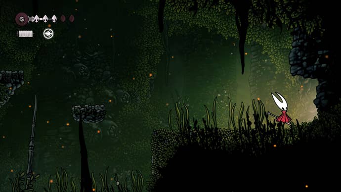 Hornet stands beside a secret wall that can be destroyed in Far Fields in Hollow Knight: Silksong