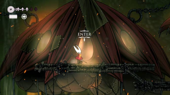 Hornet stands outside of the Seamstress' Tent in Far Fields in Hollow Knight: Silksong