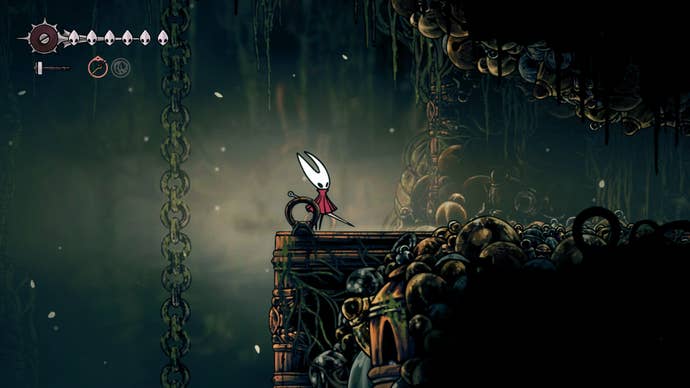 Hornet stands beside the northmost Shellwood exit into Bellhart in Hollow Knight: Silksong