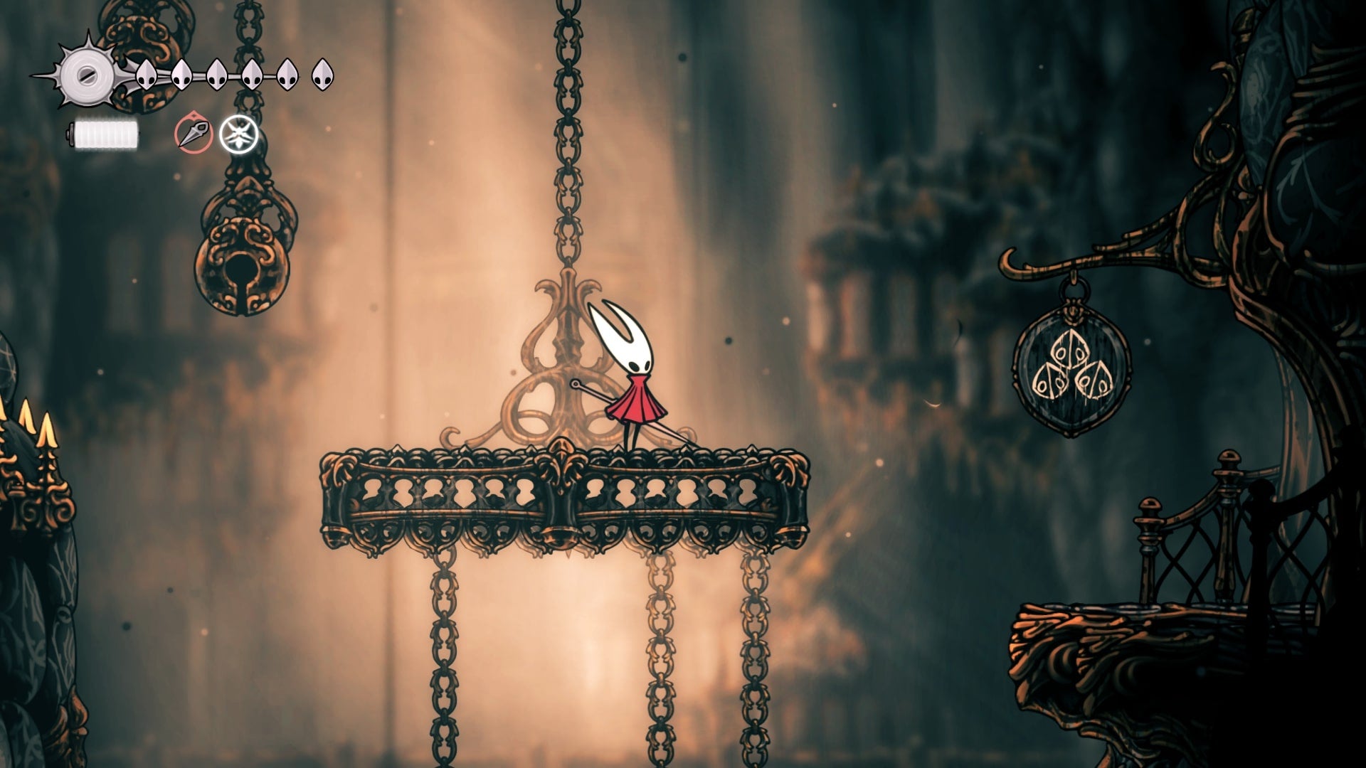 Hornet stands on a platform beside an inactive boss arena in Choral Chambers in Hollow Knight: Silksong