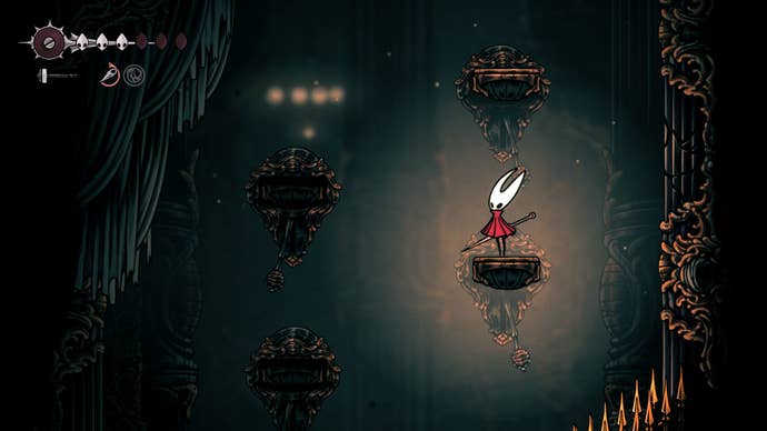 Hornet stands beside a breakable wall in Choral Chambers in Hollow Knight: Silksong