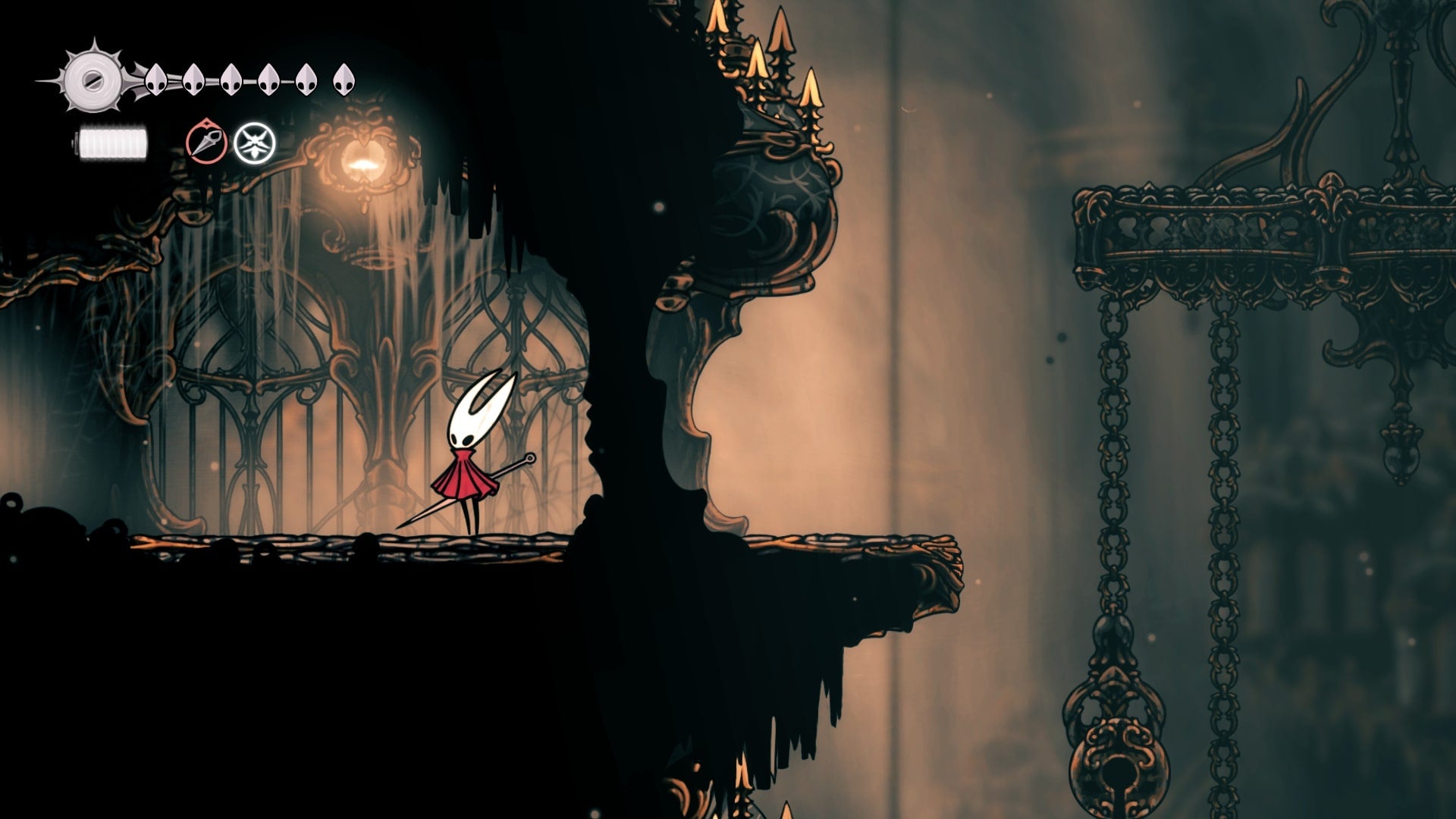 Hornet stands by an exit in Choral Chambers in Hollow Knight: Silksong