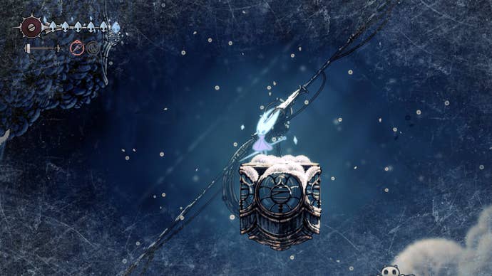 Hornet stands on a platform near a heat source while taking damage in Mount Fay in Hollow Knight: Silksong