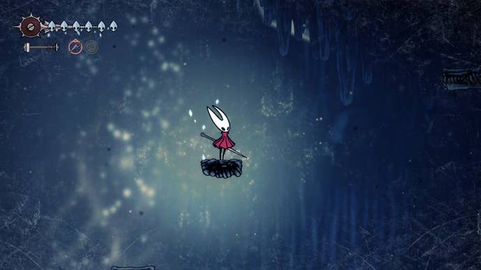 Hornet stands on a platform in Mount Fay in Hollow Knight: Silksong