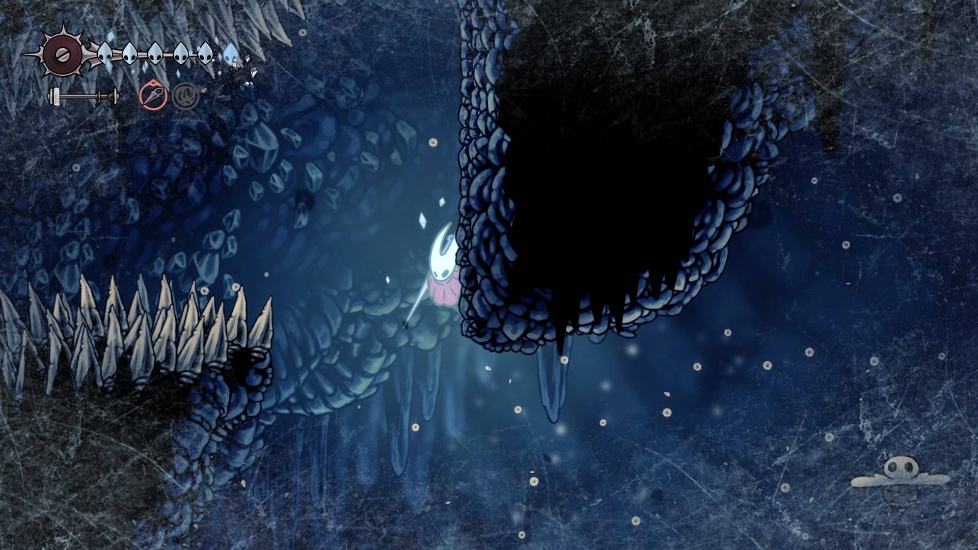Hornet Cling Grips em uma parede perto de uma passagem com espinhos em Mount Fay em Hollow Knight: Silksong