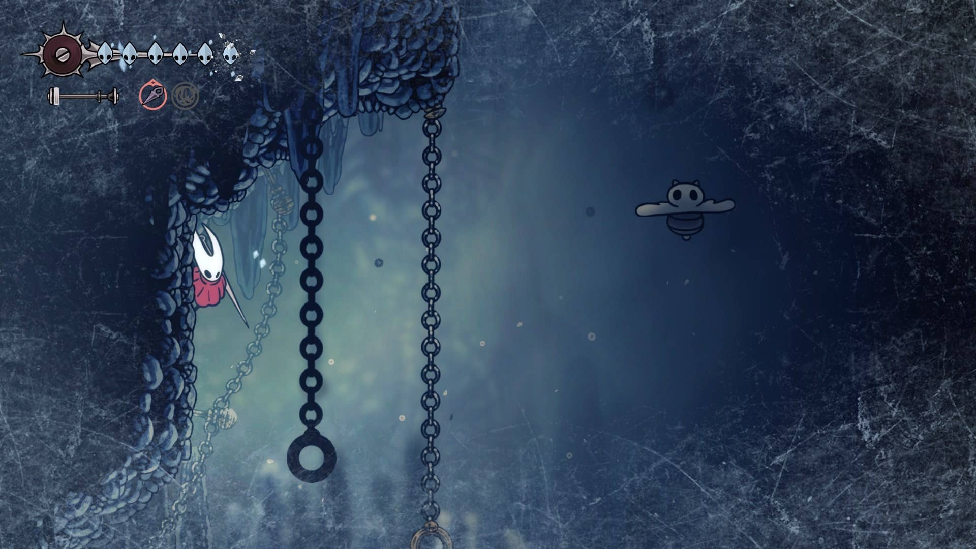 Hornet se agarra a uma parede em Mount Fay em Hollow Knight: Silksong