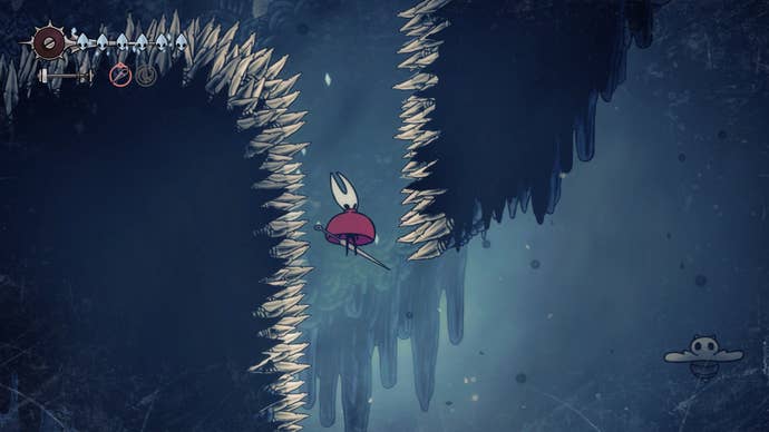 Hornet drifts down a spiked passage in Mount Fay in Hollow Knight: Silksong