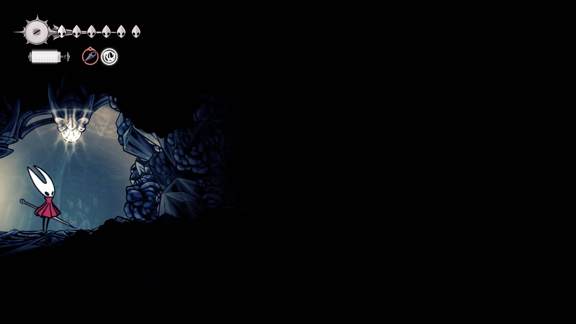 Hornet está ao lado de uma barreira quebrável em Mount Fay em Hollow Knight: Silksong