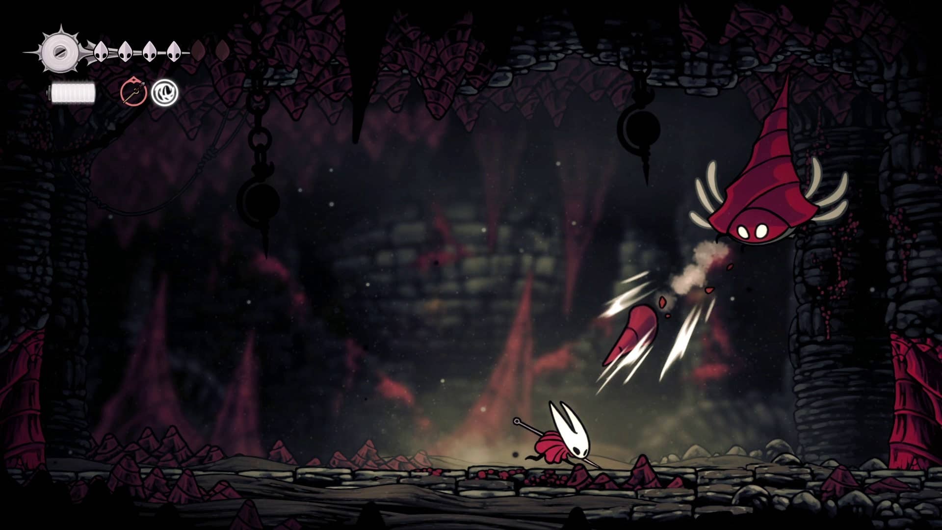 Hornet se afasta de um dos grandes projéteis de conclas em Hollow Knight: Silksong