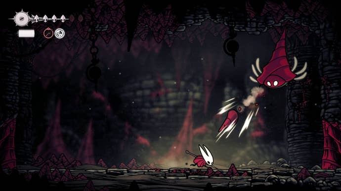 Hornet dashes away from one of the Great Conchflies projectiles in Hollow Knight: Silksong