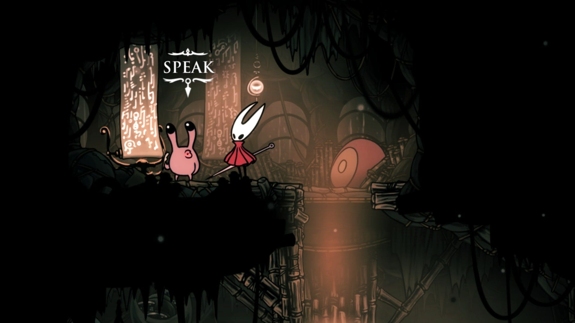 Hornet speaks to Nuu in Greymoor's Halfway Home in Hollow Knight: Silksong