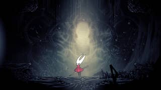 Hornet stands in front of an illuminated structure in Weavenest Atla in Hollow Knight: Silksong