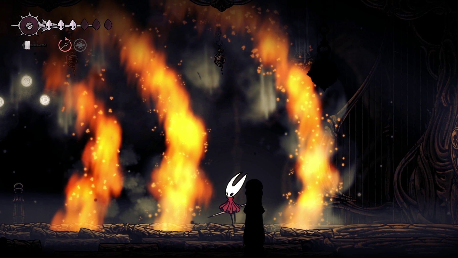 Hornet dodges The Last Judge's waves of fire in Hollow Knight: Silksong