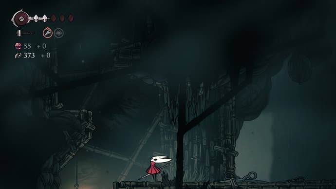 Hornet looks up a passage leading to the Chapel of the Reaper in Hollow Knight: Silksong