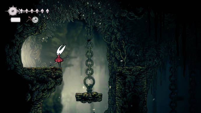 Hornet stands by an exit in Shellwood in Hollow Knight: Silksong