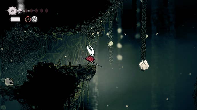 Hornet stands on a platform beside a flowerbud she can pogo off of in Shellwood in Hollow Knight: Silksong