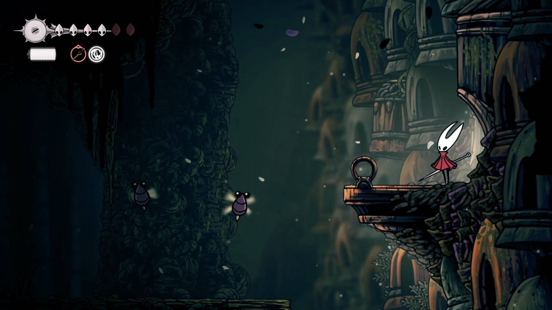 Hornet fica onde uma flor roxa normalmente é - bloqueando uma câmara escondida - em Shellwood em Hollow Knight: Silkrong