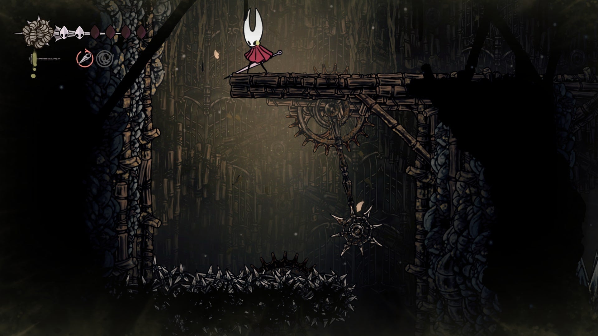 Hornet stands on a platform while looking down at a spike trap and spiked terrain in Sinner's Road in Hollow Knight: Silksong